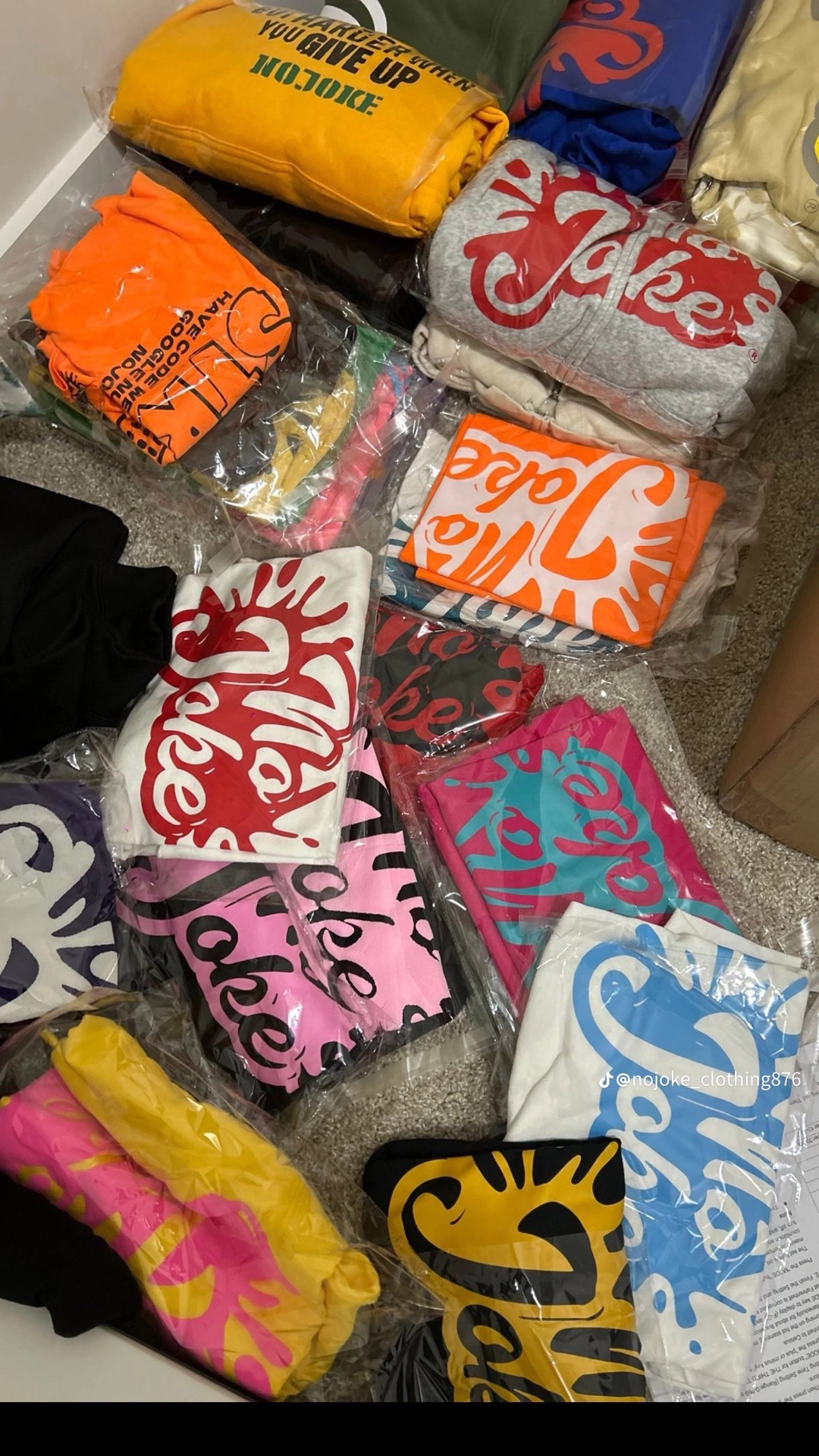 No Joke clothing pieces packaged and ready to ship